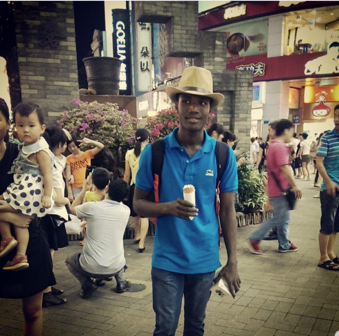 Musa in a busy Asian street market